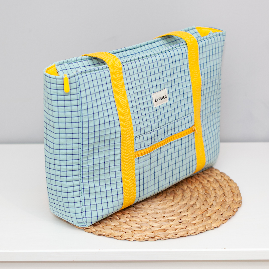 Bolso artesanal ALBA de algodón con colores azul y amarillo inspirado en el amanecer