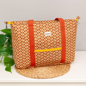 Bolso mediano artesanal Aura hecho a mano en algodón con estampado geométrico setentero